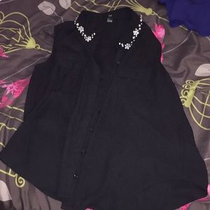 Black no sleeve top with bedazzled collar